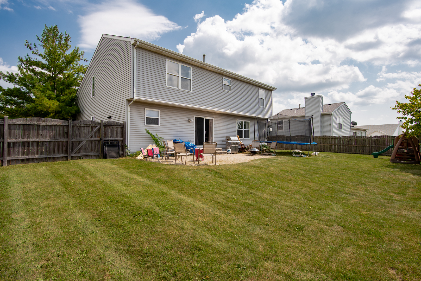 1010 Pheasant Run Zion, IL 60099 - Photo 3 of 4 a swimming pool view with a seating space