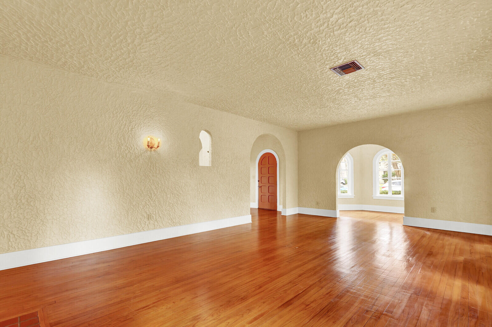 322 Westminster Road West Palm Beach, FL 33405 - Photo 12 of 68 a view of empty room with wooden floor and fan