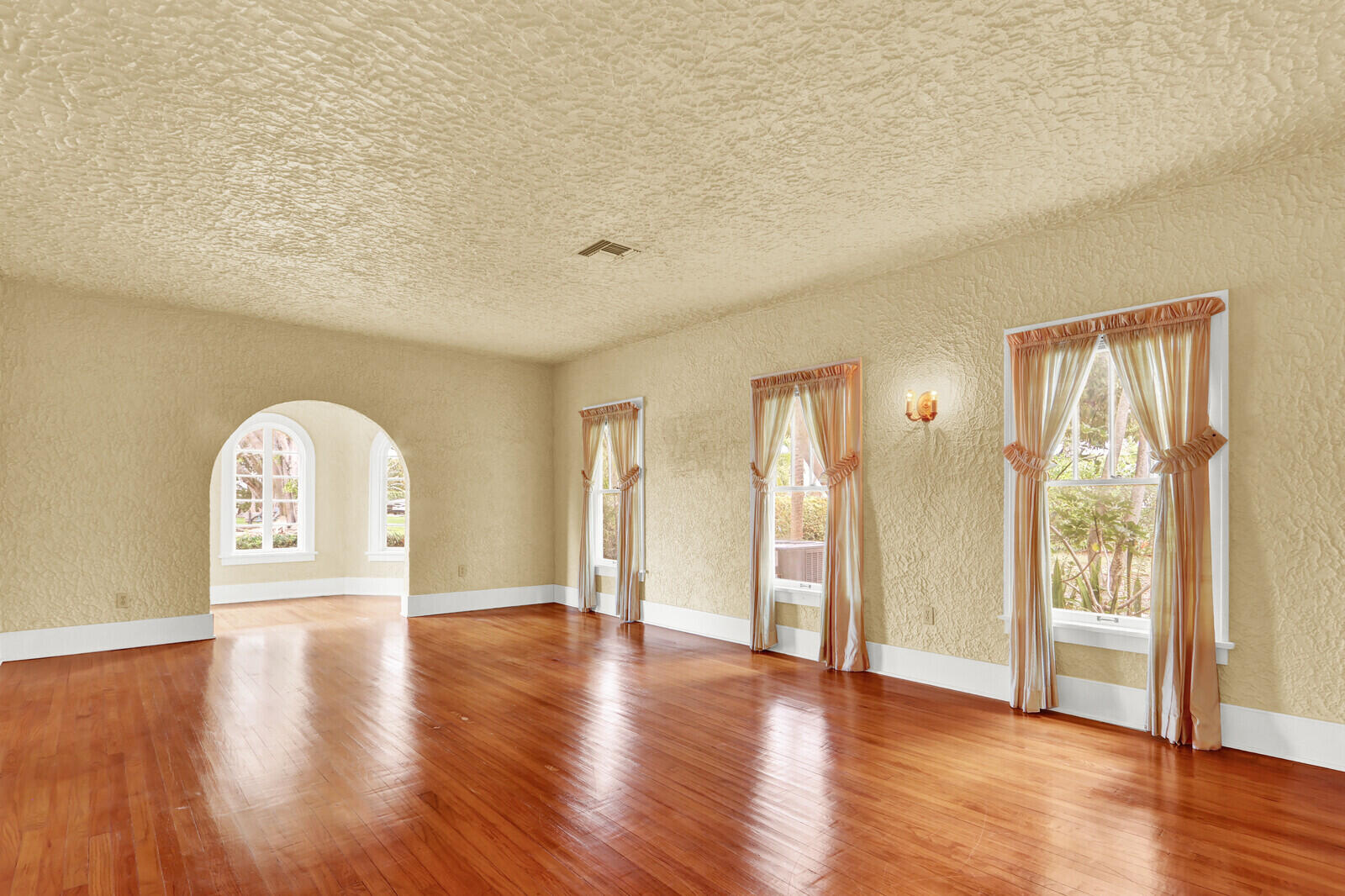 322 Westminster Road West Palm Beach, FL 33405 - Photo 14 of 68 a view of an empty room with wooden floor and a window