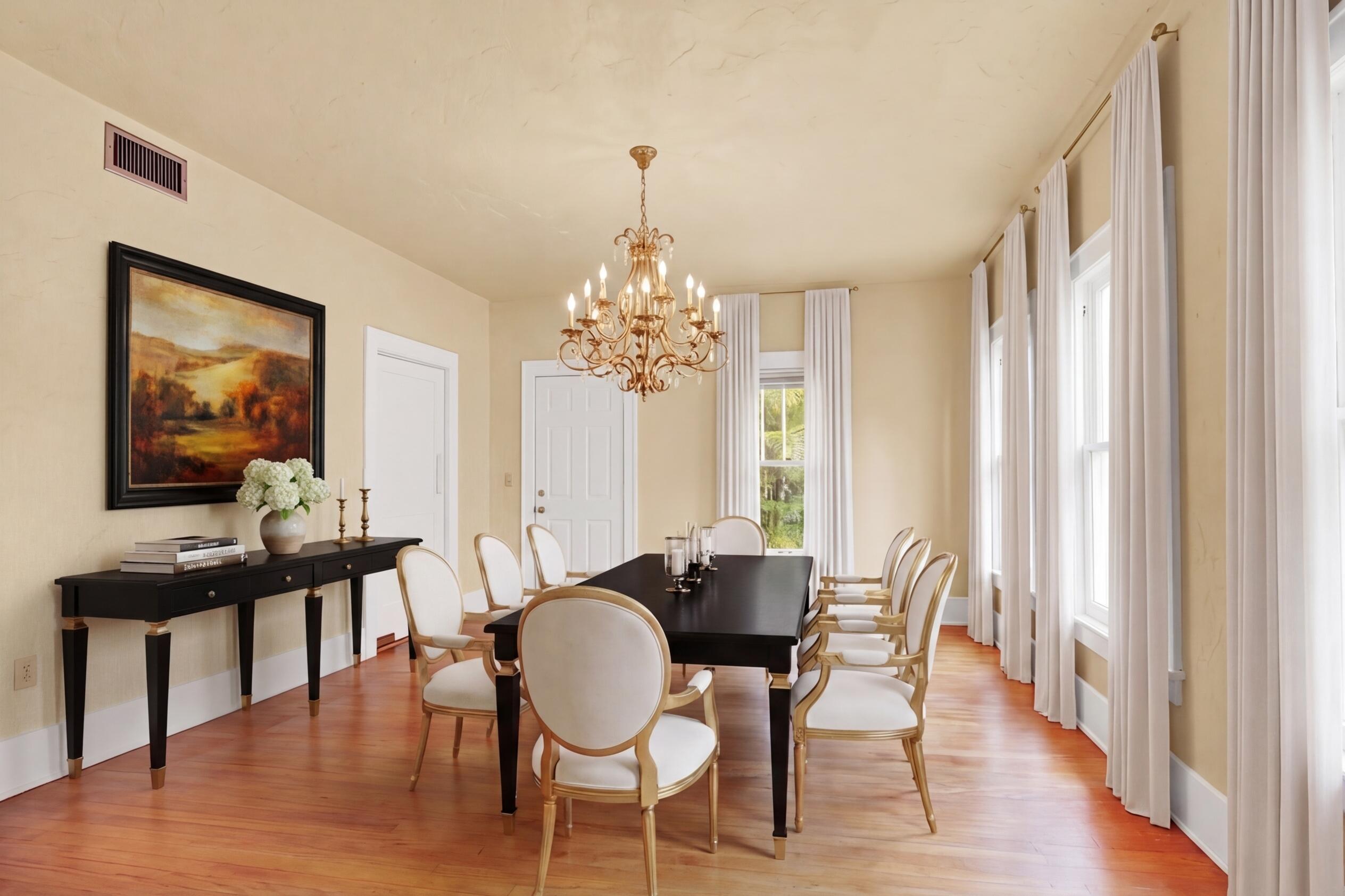322 Westminster Road West Palm Beach, FL 33405 - Photo 19 of 68 a view of a dining room with furniture window and wooden floor