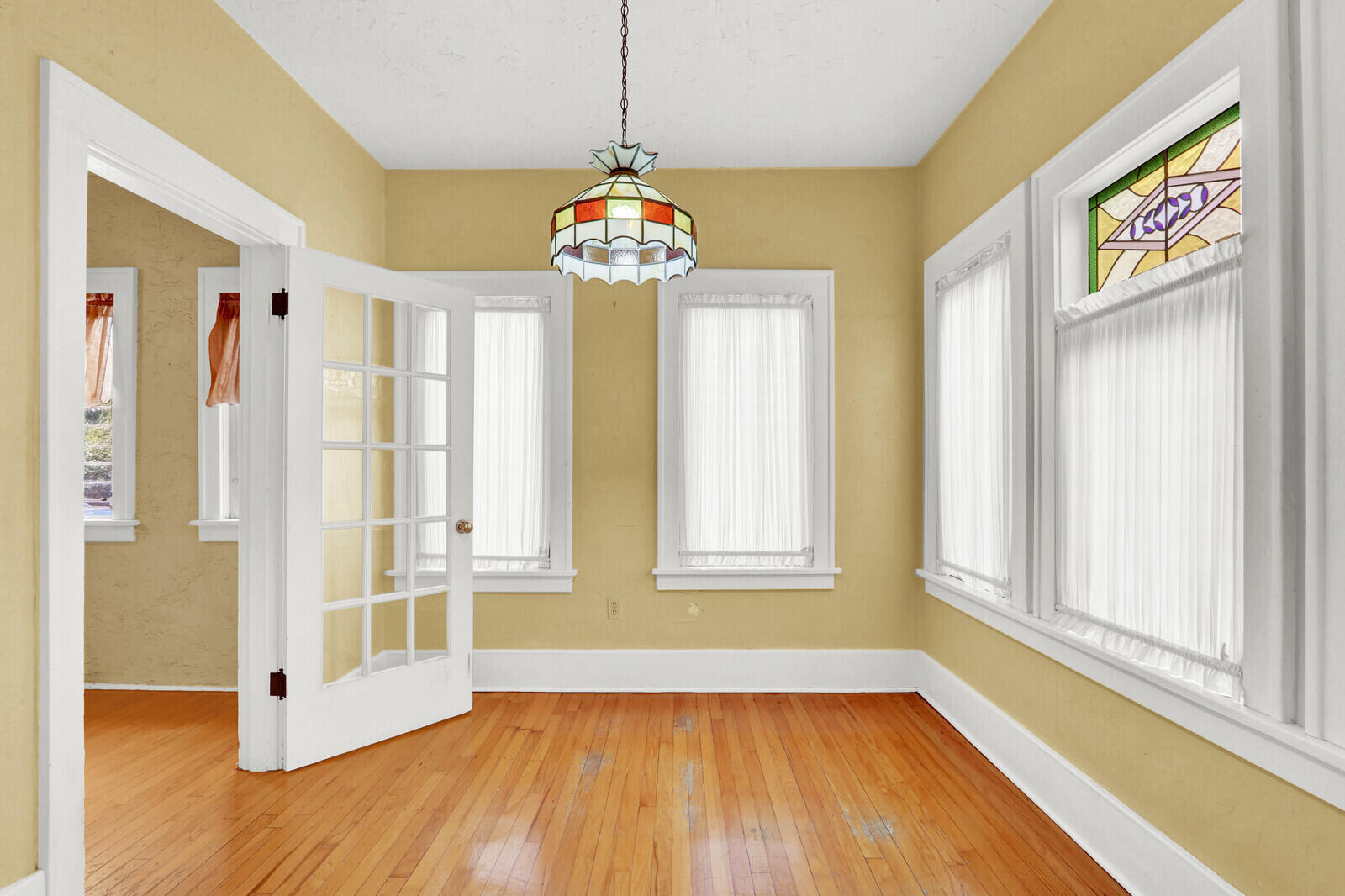 322 Westminster Road West Palm Beach, FL 33405 - Photo 23 of 68 a view of an empty room with wooden floor and a window