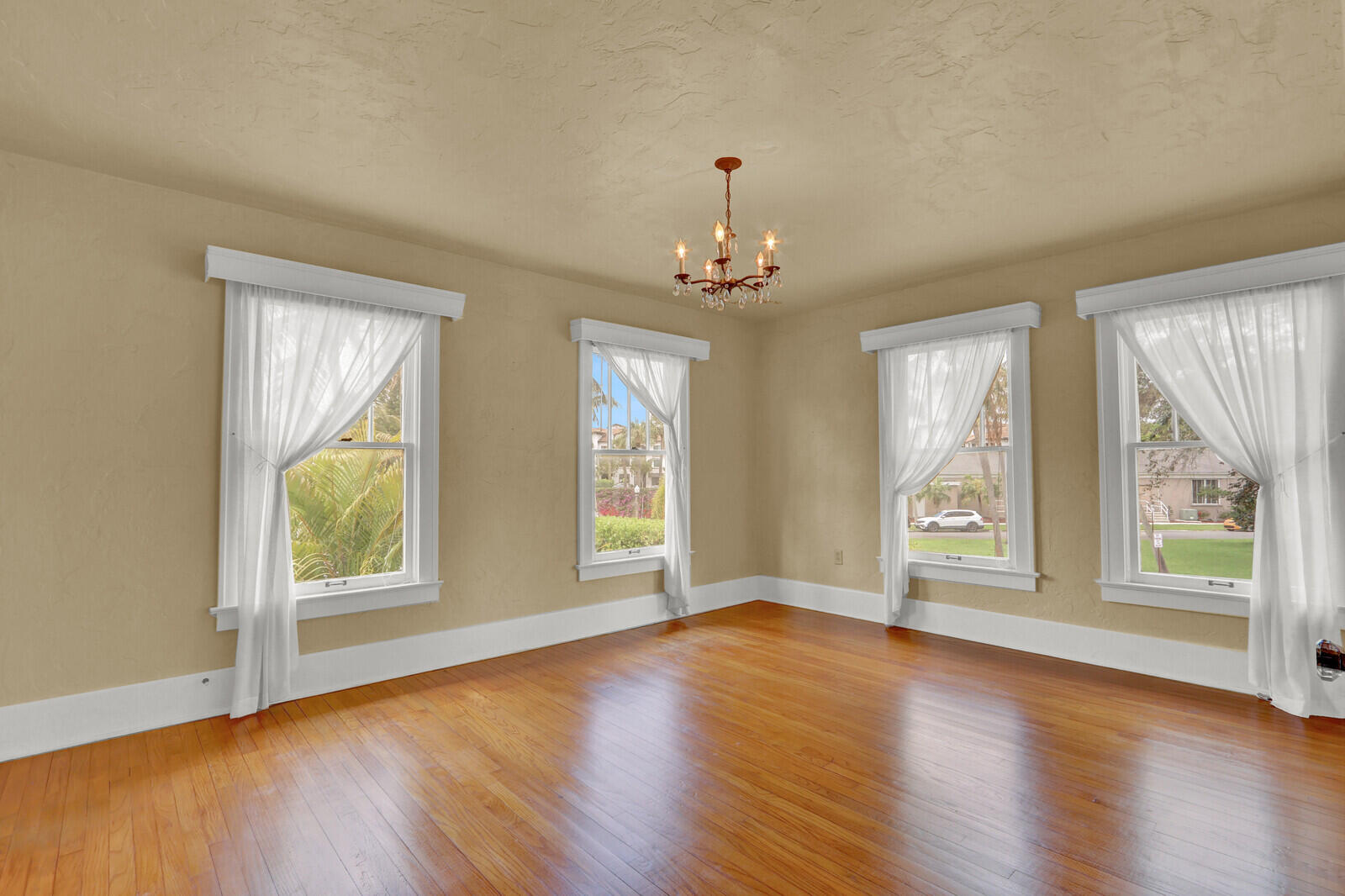 322 Westminster Road West Palm Beach, FL 33405 - Photo 33 of 68 a view of an empty room with wooden floor and a window