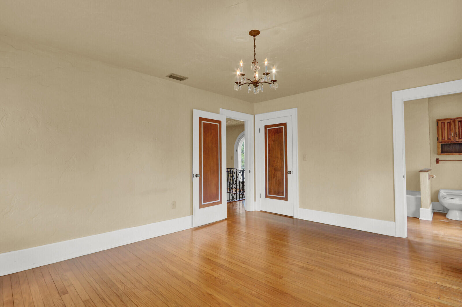 322 Westminster Road West Palm Beach, FL 33405 - Photo 35 of 68 a view of an empty room with wooden floor