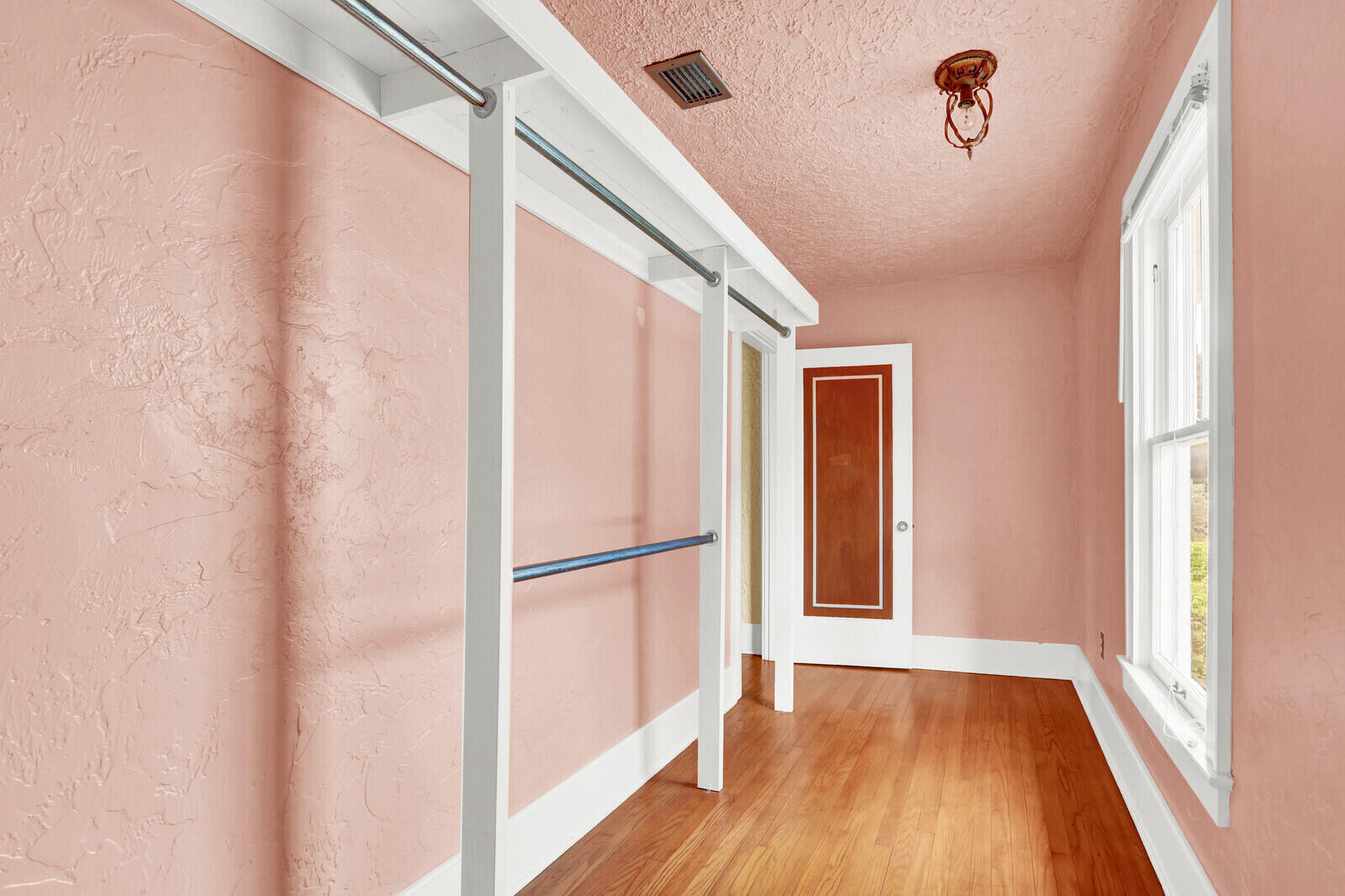 322 Westminster Road West Palm Beach, FL 33405 - Photo 42 of 68 a view of front door with wooden floor