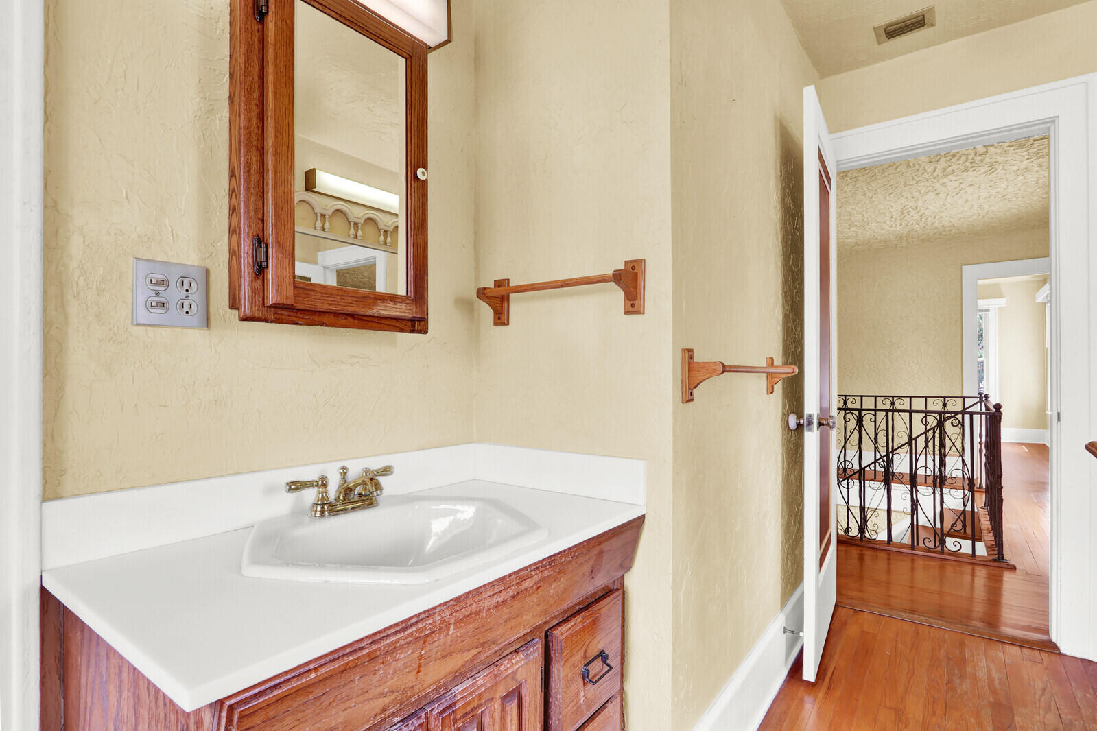 322 Westminster Road West Palm Beach, FL 33405 - Photo 43 of 68 a bathroom with a sink and a mirror