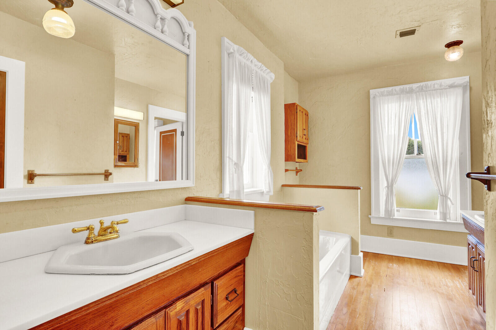 322 Westminster Road West Palm Beach, FL 33405 - Photo 44 of 68 a bathroom with a sink and a mirror