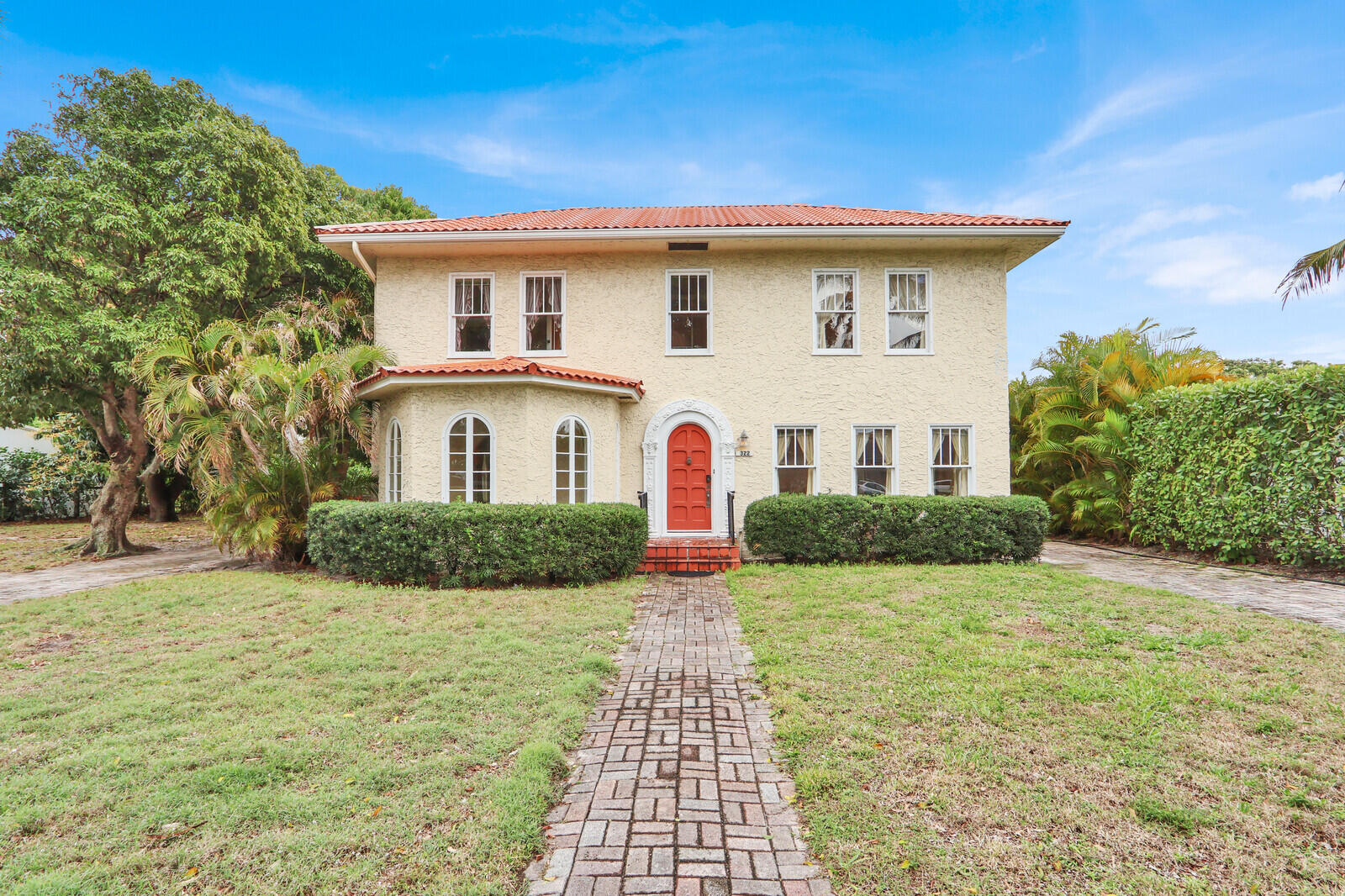 322 Westminster Road West Palm Beach, FL 33405 - Photo 67 of 68 a front view of house with yard and green space