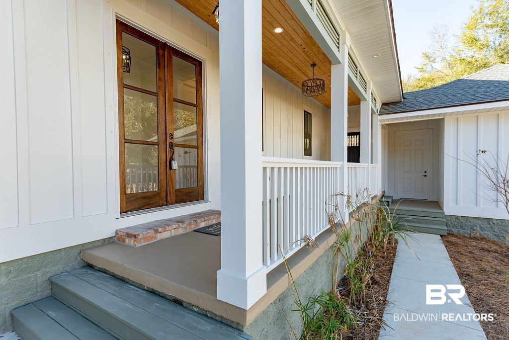 389 Pecan Avenue Fairhope, AL 36532 - Photo 5 of 50 Main entry sits way back off the road...courtyard