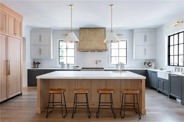a kitchen with a table and chairs in it