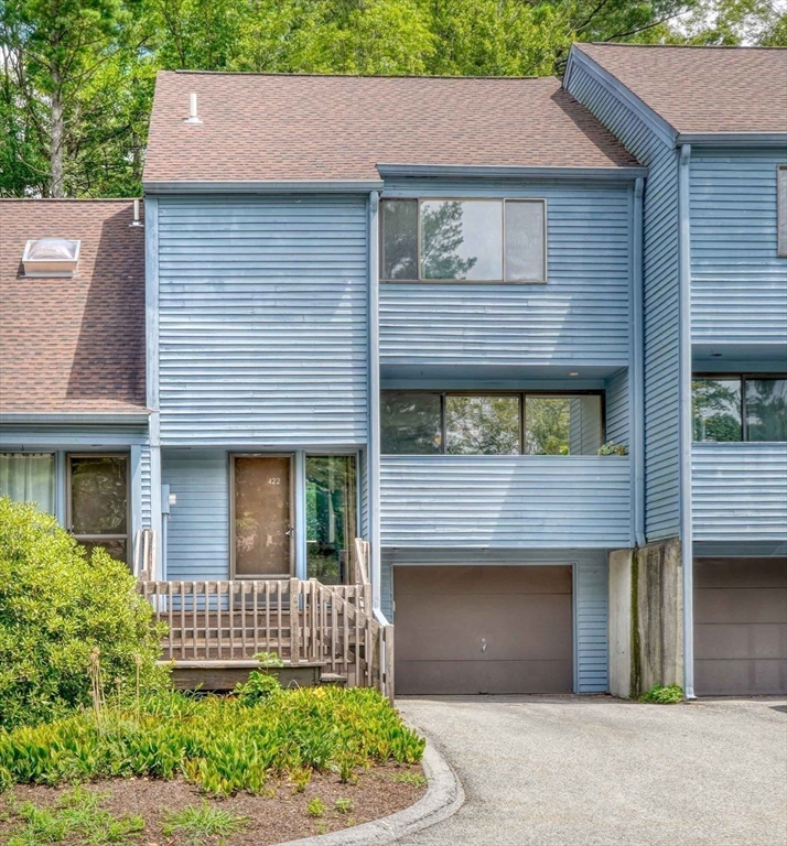 422 Great Elm Way, Unit 422 Acton, MA 01718 - Photo 26 of 30 a front view of a house with garden