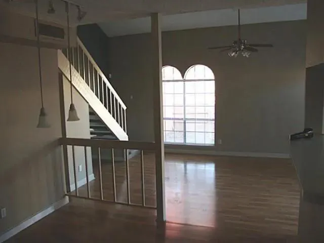 a view of entryway and hall with a window