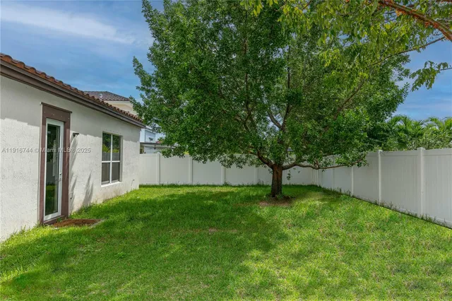 a house view with a garden space