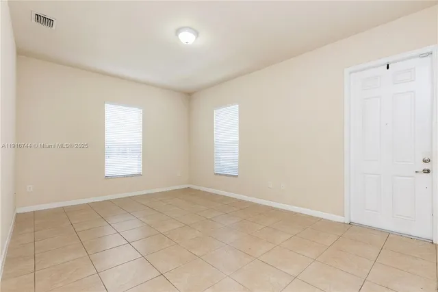 an empty room with a entryway