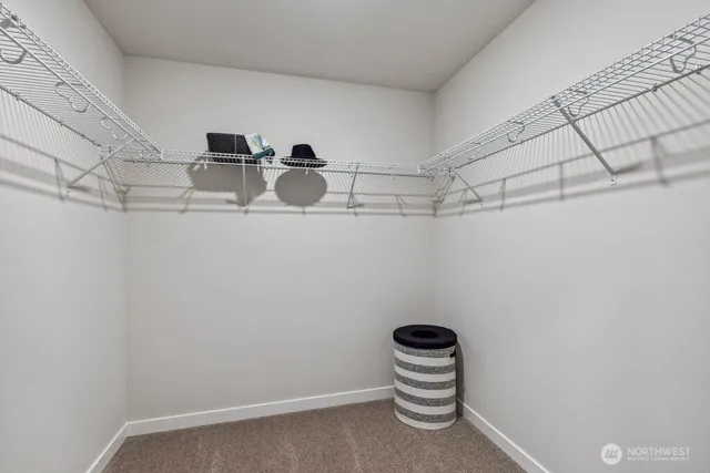 a view of room with racks on the wall