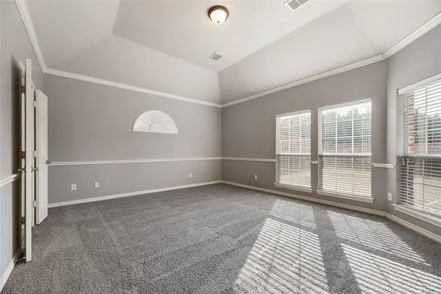 a view of a livingroom with an empty space and window