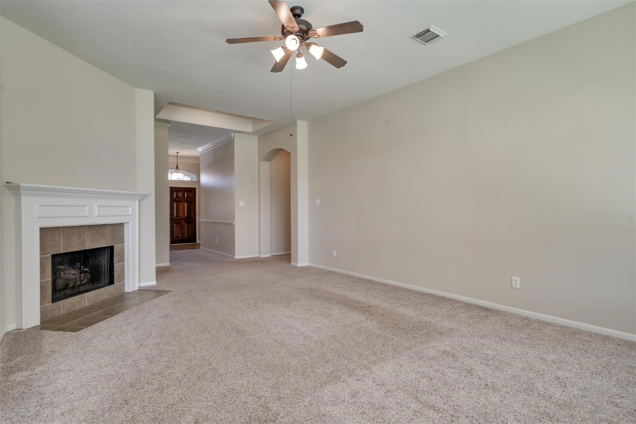 3419 La Fleur Lane Spring, TX 77388 - Photo 10 of 26 a view of empty room with fireplace and fan