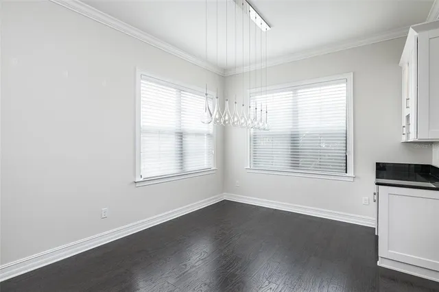 a bathroom with a sink a mirror and a toilet