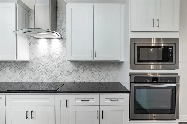 a view of a porch with a door and balcony