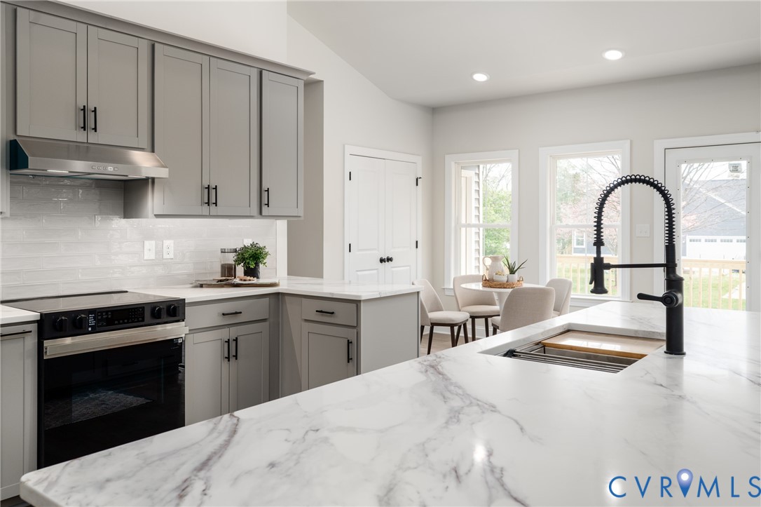 2301 Larkwood Road Henrico, VA 23294 - Photo 12 of 44 a kitchen with sink and stove