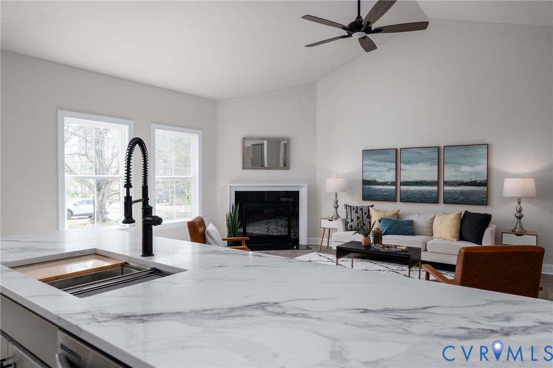 2301 Larkwood Road Henrico, VA 23294 - Photo 16 of 44 a living room with furniture and a fireplace