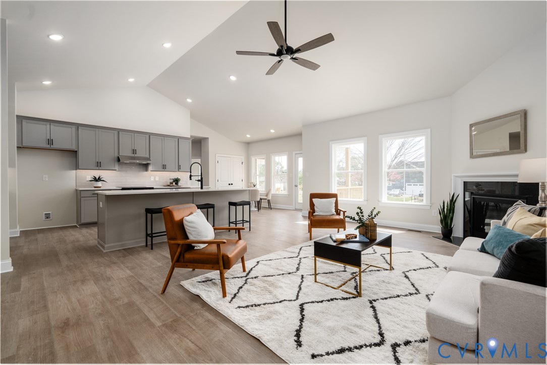 2301 Larkwood Road Henrico, VA 23294 - Photo 18 of 44 a living room with furniture and kitchen view