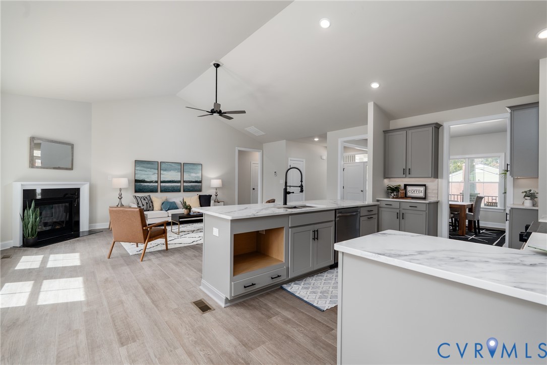 2301 Larkwood Road Henrico, VA 23294 - Photo 20 of 44 a view of kitchen with sink microwave and cabinets