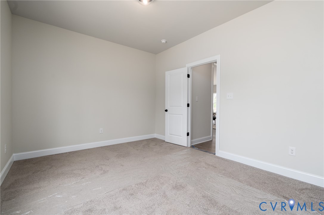 2301 Larkwood Road Henrico, VA 23294 - Photo 30 of 44 an empty room with an entryway