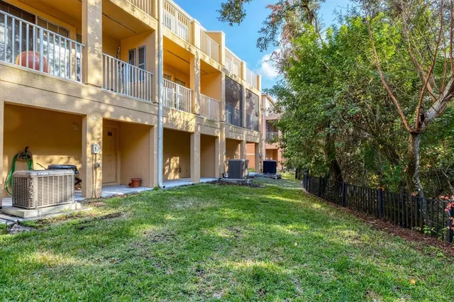 a view of a building with a yard