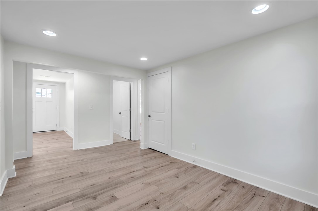 7 Beaverdam Road Williamston, SC 29697 - Photo 12 of 27 Recessed lighting illuminates this versatile room with durable LVP flooring.