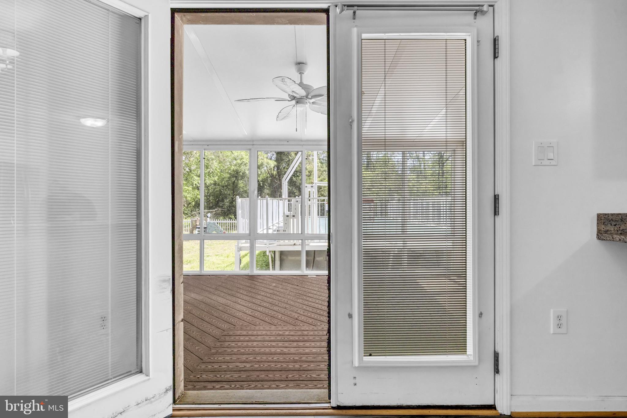 7392 Todds Wharf Road Preston, MD 21655 - Photo 13 of 63 View from DR into sunroom