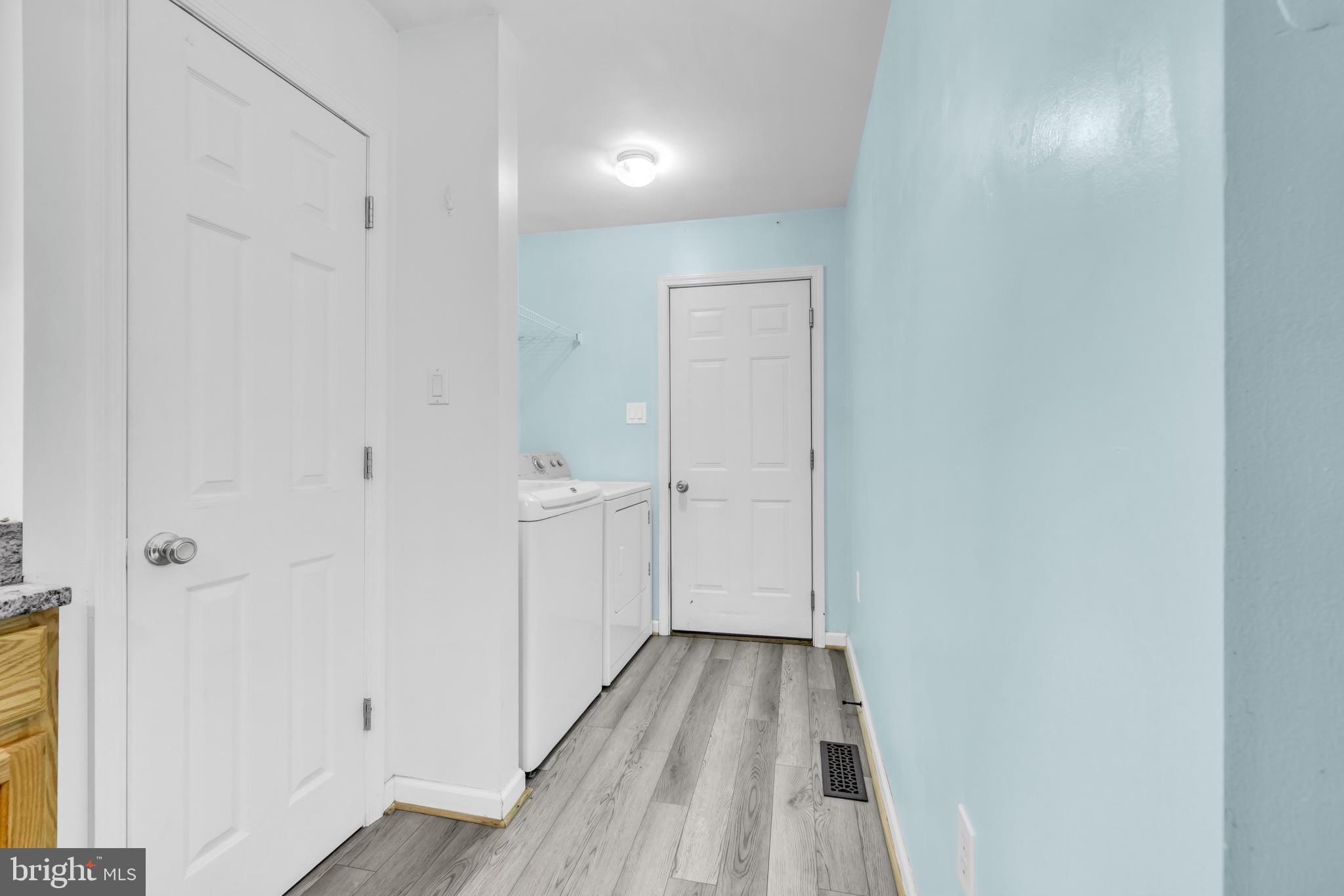 7392 Todds Wharf Road Preston, MD 21655 - Photo 21 of 63 a view of a room with wooden floor
