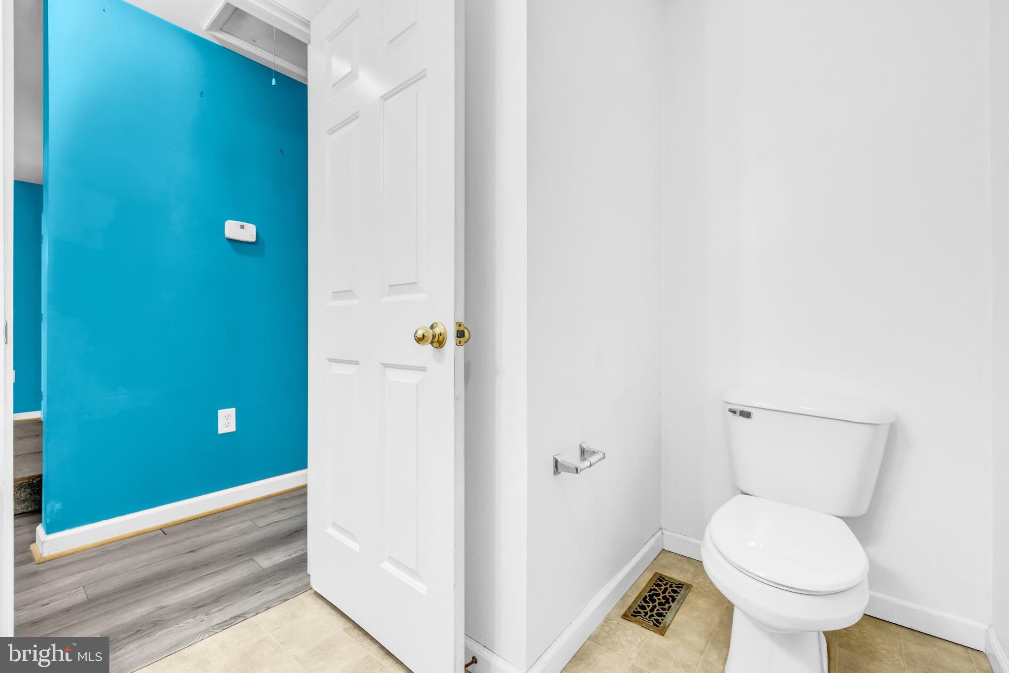 7392 Todds Wharf Road Preston, MD 21655 - Photo 35 of 63 a bathroom with a toilet and a shower