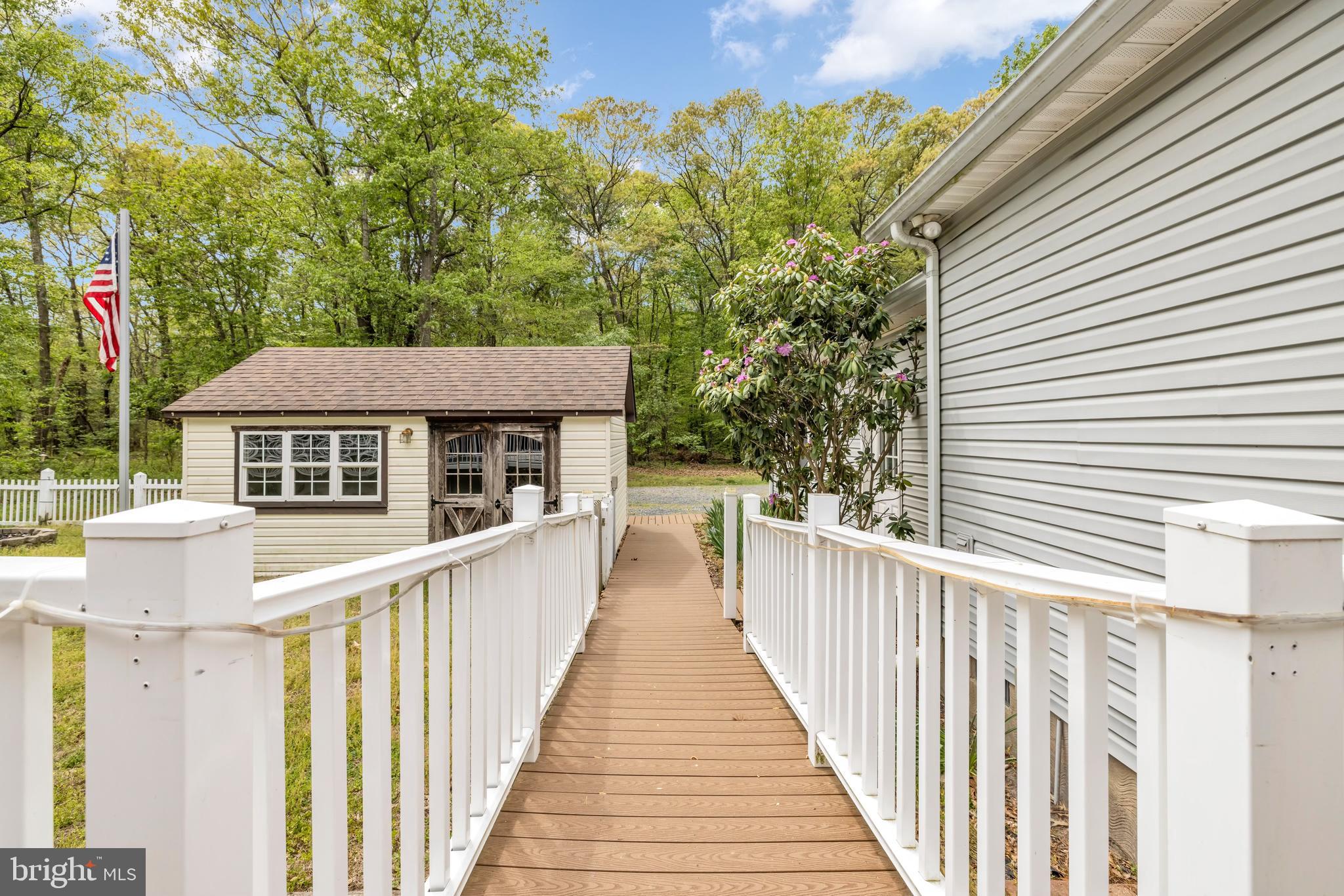 7392 Todds Wharf Road Preston, MD 21655 - Photo 47 of 63 Ramp from sunroom to driveway