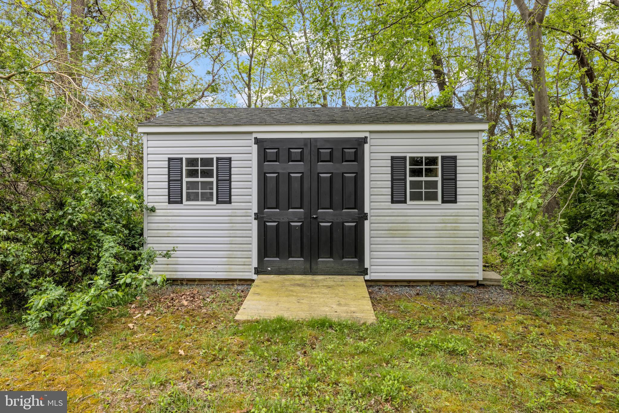7392 Todds Wharf Road Preston, MD 21655 - Photo 54 of 63 a view of a house with a yard