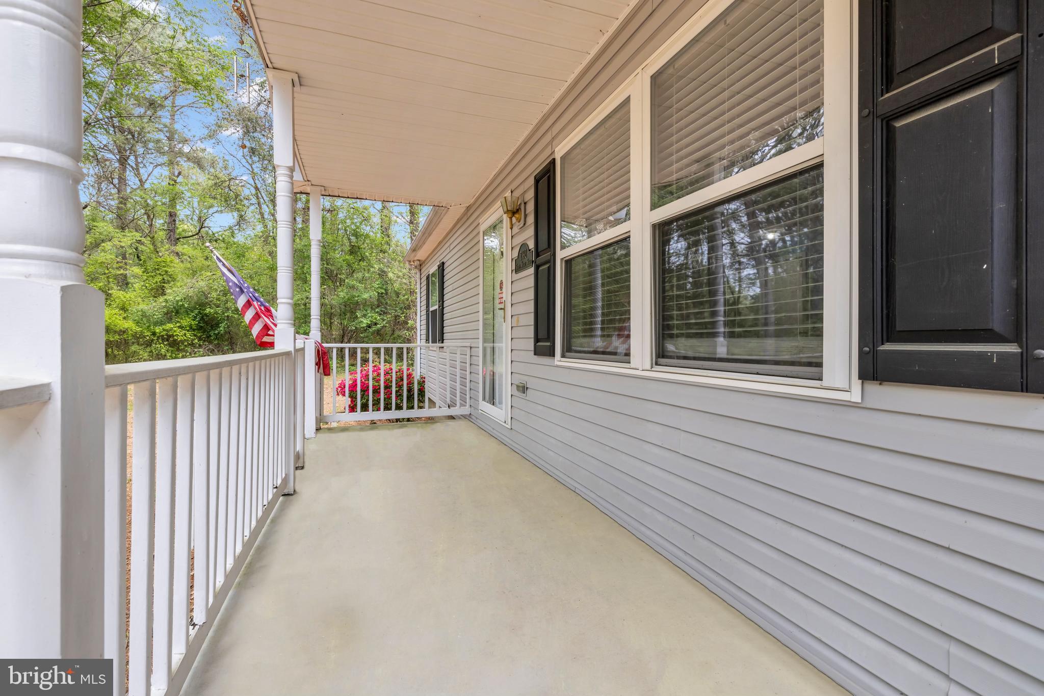 7392 Todds Wharf Road Preston, MD 21655 - Photo 8 of 63 a view of a house with porch and wooden floor