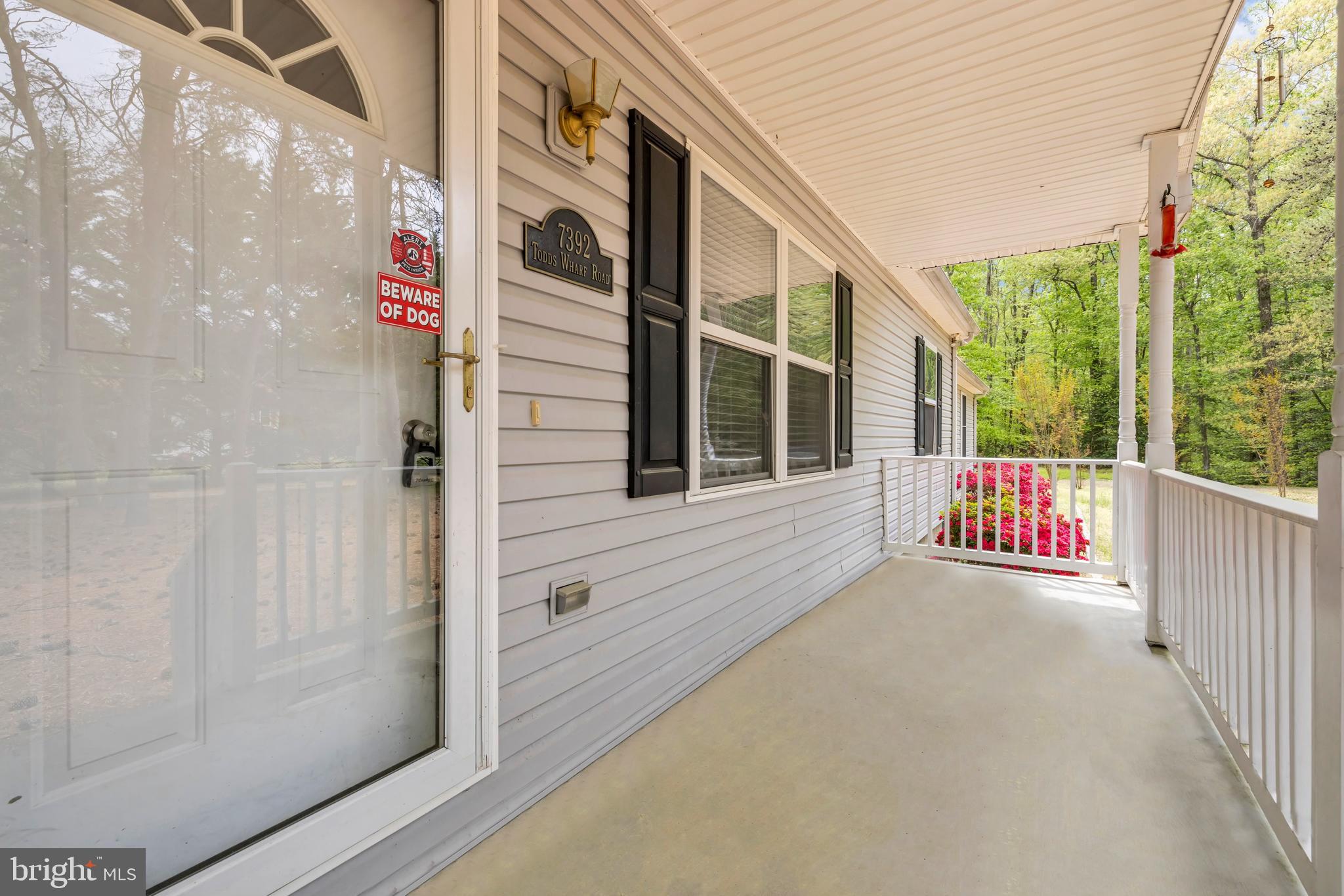 7392 Todds Wharf Road Preston, MD 21655 - Photo 9 of 63 Opposite view of the front porch