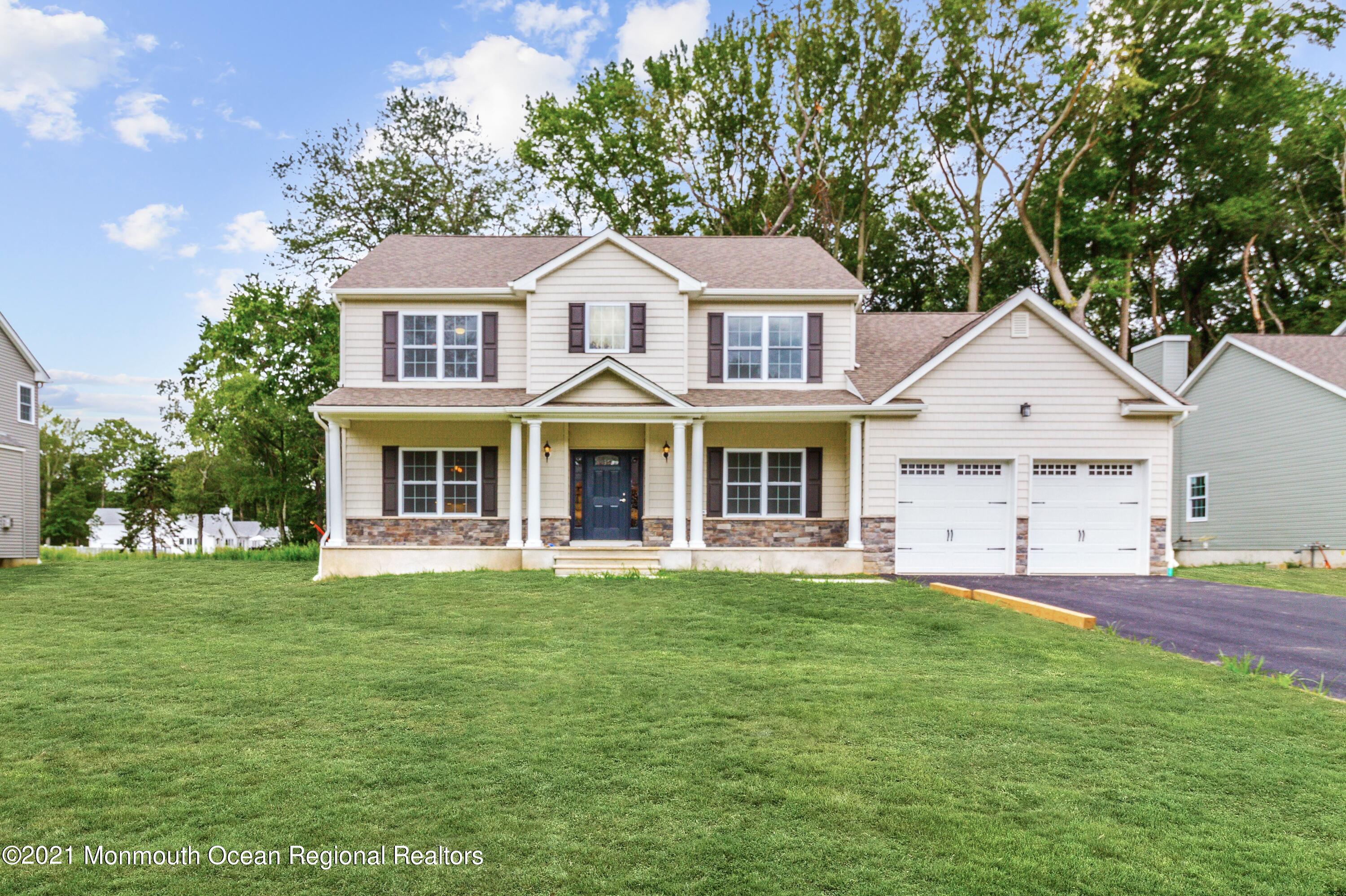 a view of house with a garden