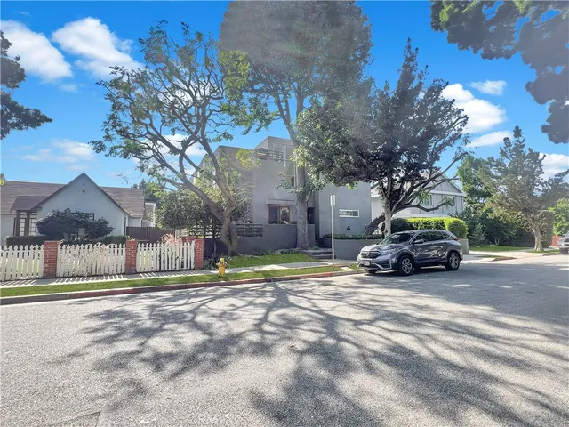 a car parked in front of a house