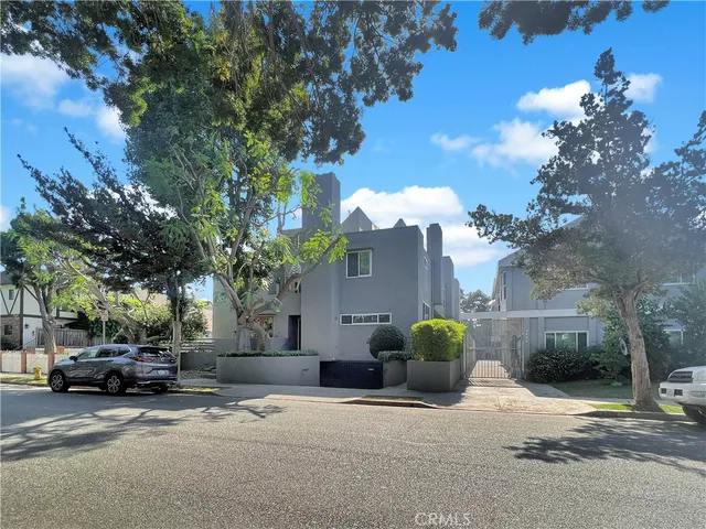 a view of street with parked cars