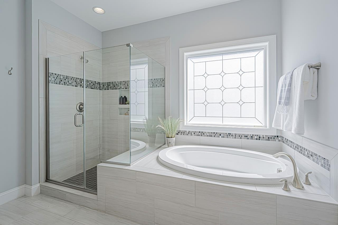 7605 Stonehenge Farm Lane Raleigh, NC 27613 - Photo 21 of 30 Large master bathroom with large walk-in closet with built-ins Master bathroom