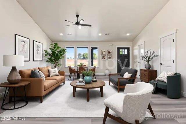 a living room with furniture potted plant and a window
