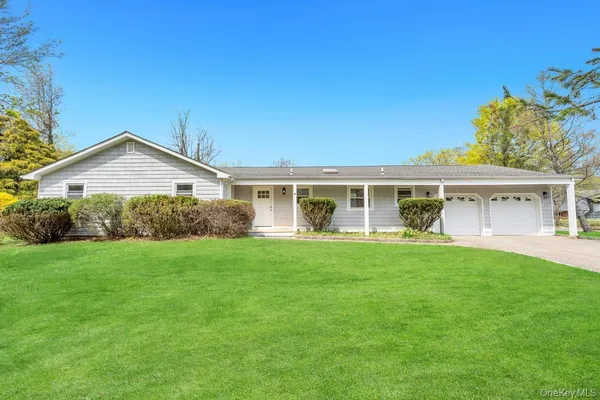 front view of a house and a yard
