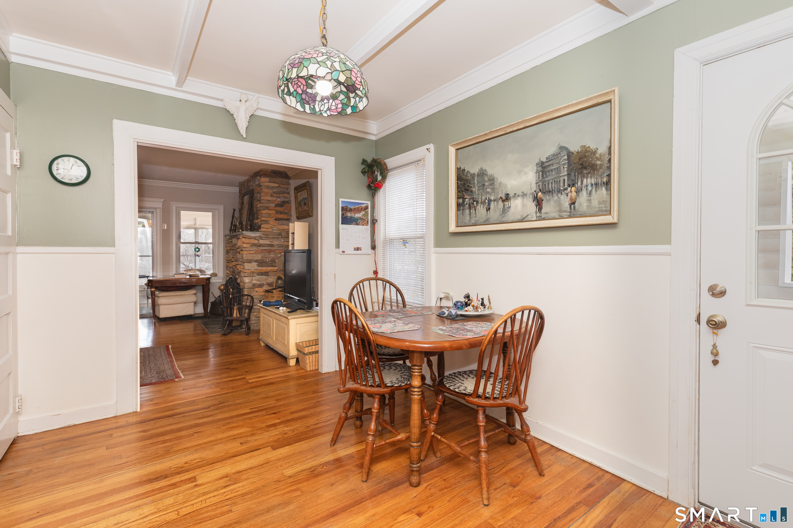 14 Laurel Trail Newtown, CT 06482 - Photo 15 of 39 a view of a dining room with furniture wooden floor and a chandelier