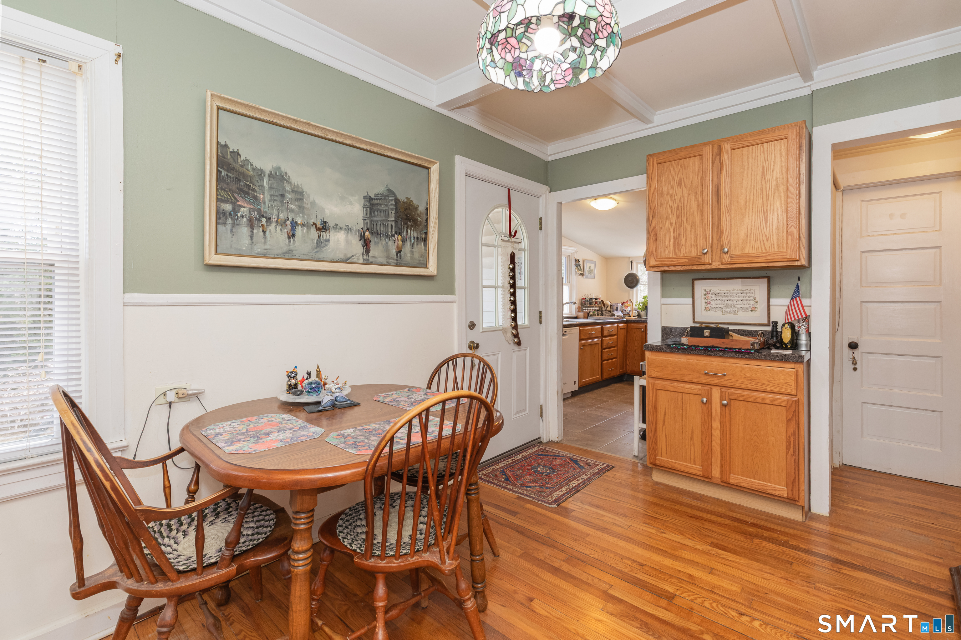 14 Laurel Trail Newtown, CT 06482 - Photo 16 of 39 a kitchen with granite countertop stainless steel appliances a dining table and chairs