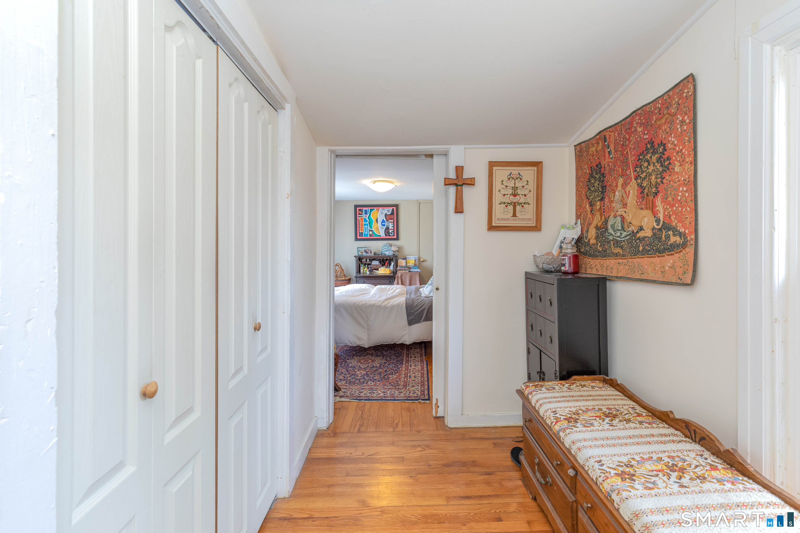 14 Laurel Trail Newtown, CT 06482 - Photo 19 of 39 a view of a hallway with a bedroom