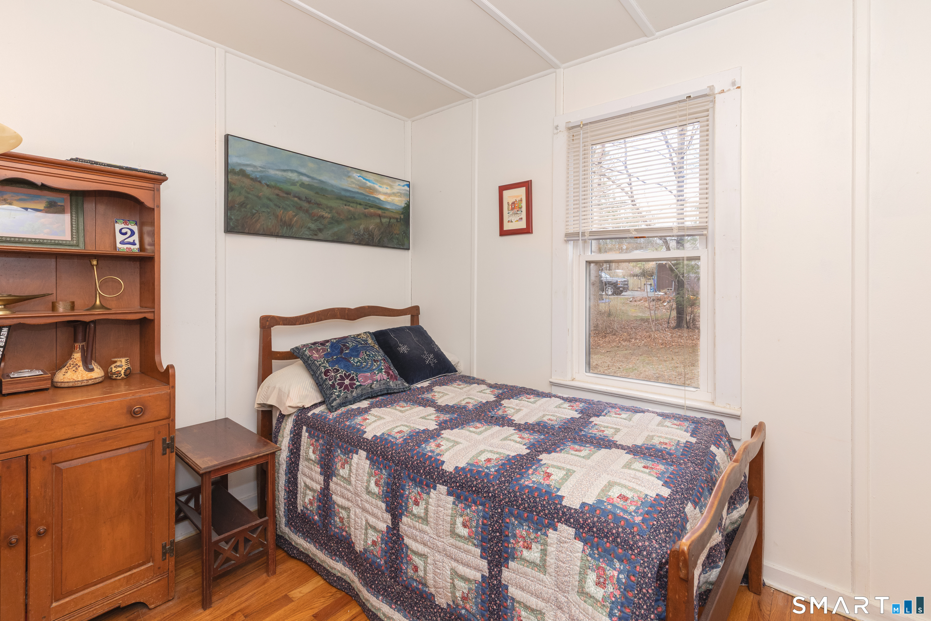 14 Laurel Trail Newtown, CT 06482 - Photo 23 of 39 a bedroom with a bed and two windows
