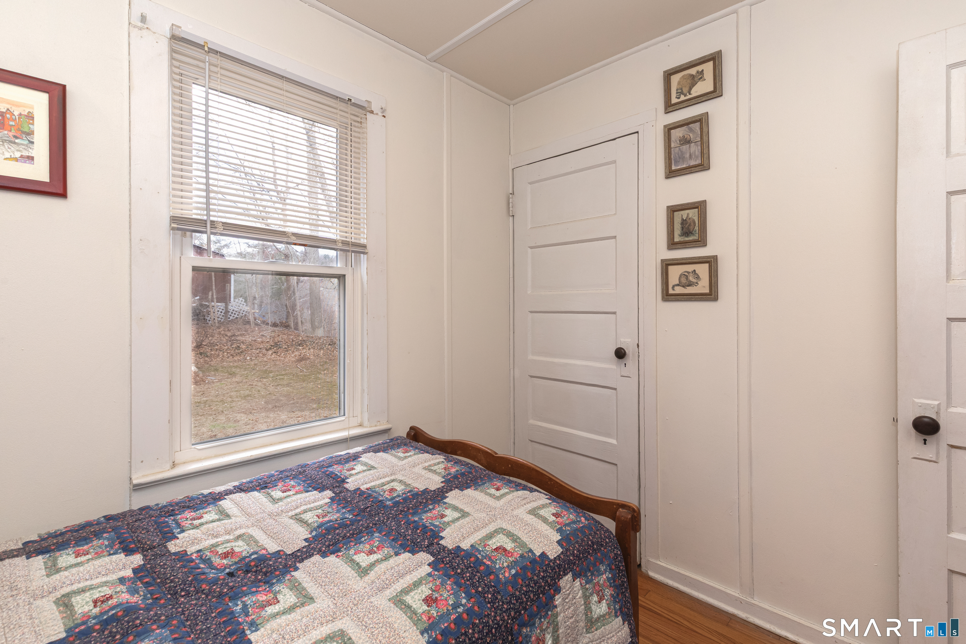 14 Laurel Trail Newtown, CT 06482 - Photo 24 of 39 a bedroom with a bed and a window