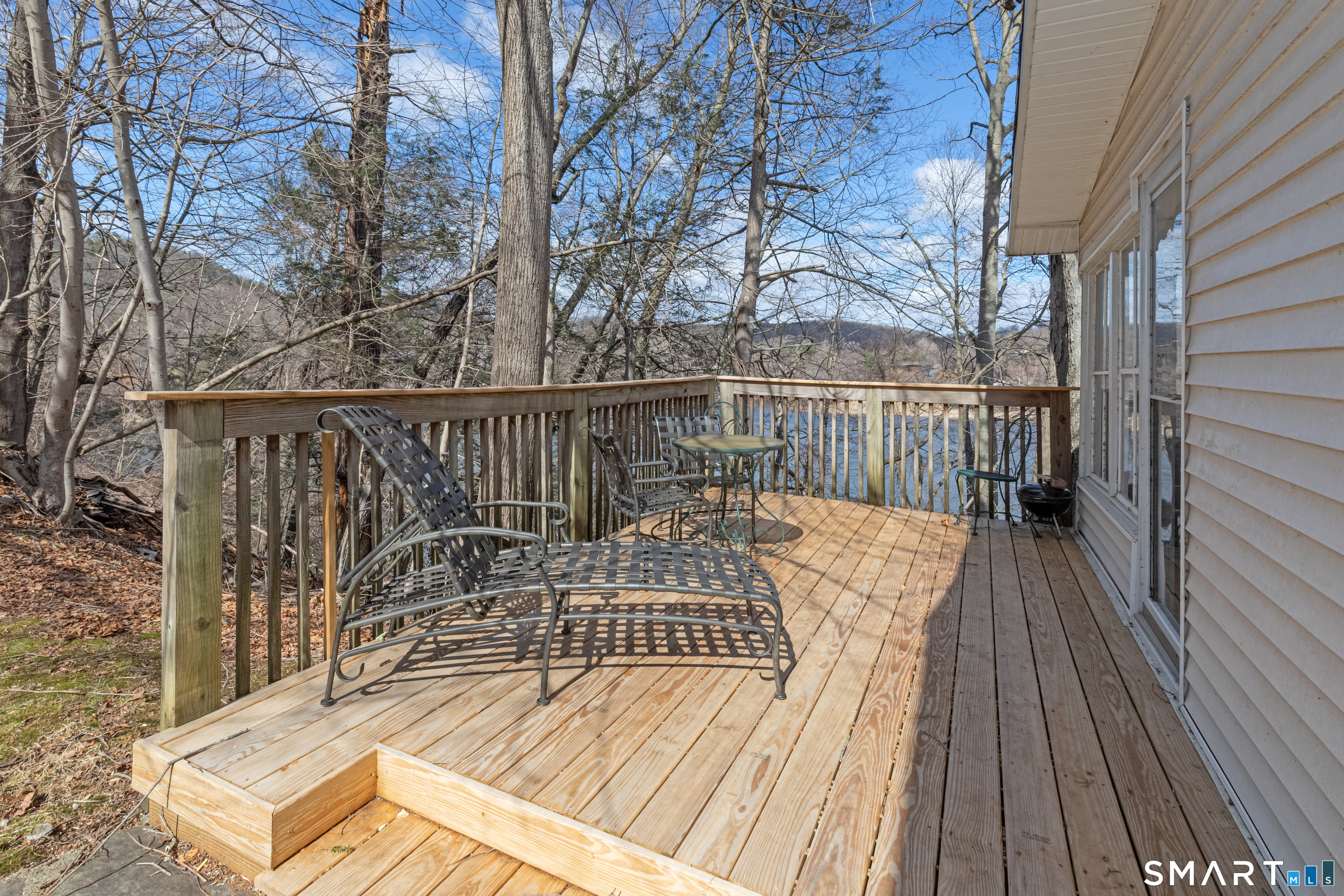 14 Laurel Trail Newtown, CT 06482 - Photo 30 of 39 a view of balcony with wooden floor and fence