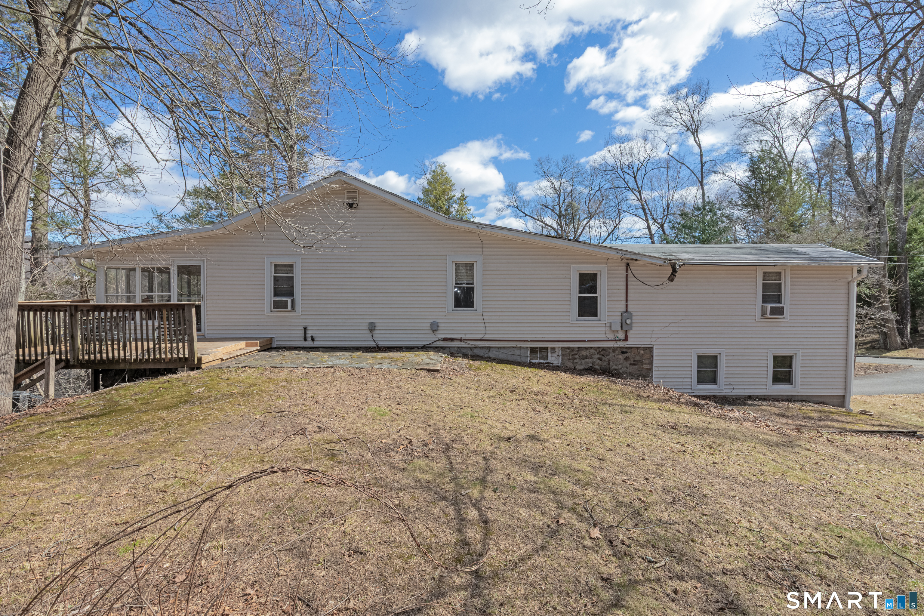 14 Laurel Trail Newtown, CT 06482 - Photo 32 of 39 a house with trees in front of it