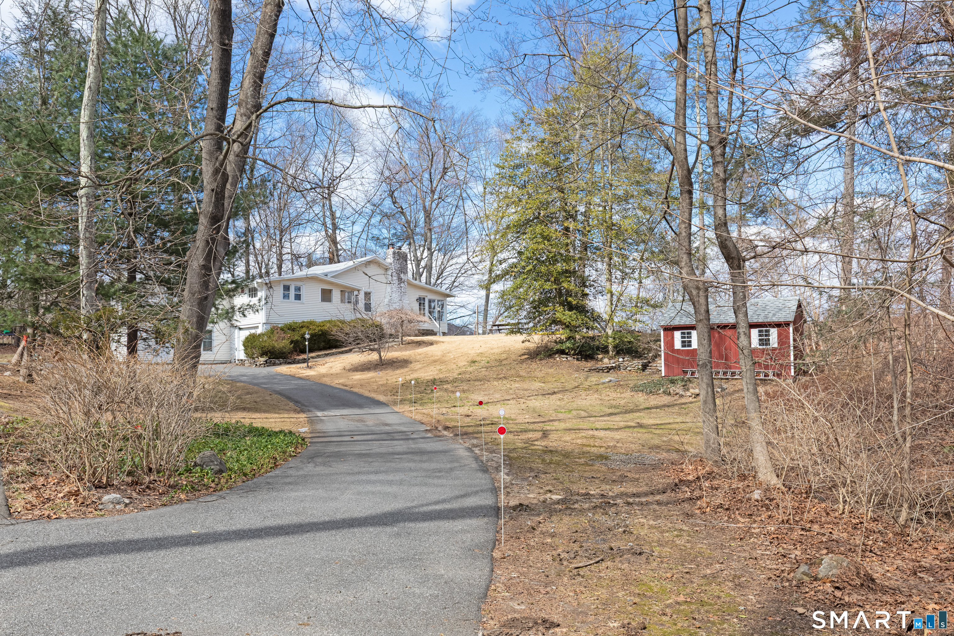 14 Laurel Trail Newtown, CT 06482 - Photo 35 of 39 a street view with large trees